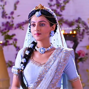 Mallika Singh as Radha in Radha Krishna TV Series with Floral Saree and Crown HD phone wallpaper