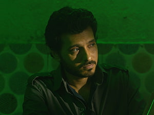 Munna Bhaiya from Mirzapur in moody green-lit close-up portrait HD wallpaper