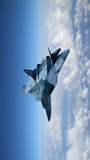 Sukhoi Su-57 Stealth Fighter Jet Banking Through Clouds HD phone wallpaper