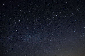 Deep Space Starfield with Dense Celestial Points Against a Dark Night Sky HD wallpaper