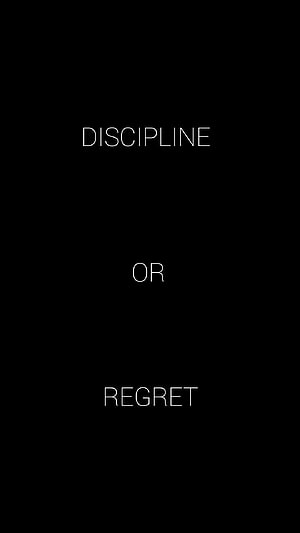 Minimalist Black Background with White Text Reading Discipline Or Regret HD phone wallpaper