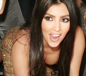Kim Kardashian in a Gold Sequined Dress at a Social Event HD wallpaper