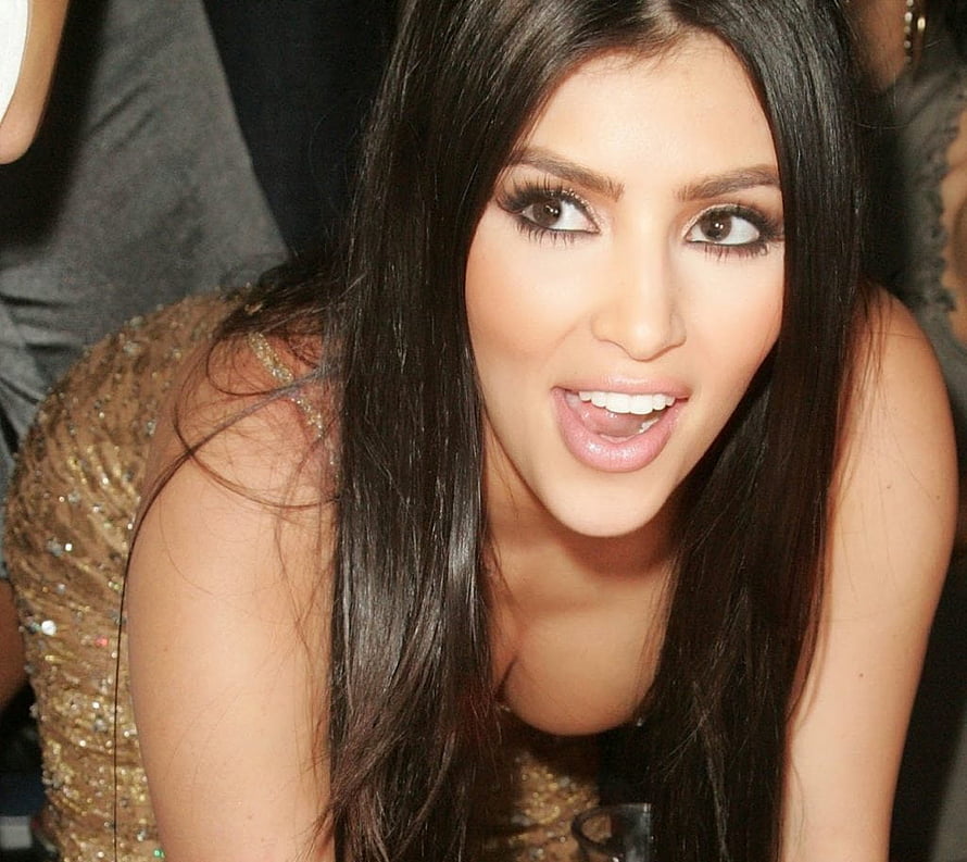 Kim Kardashian in a Gold Sequined Dress at a Social Event HD wallpaper