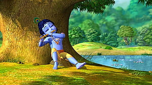 Little Krishna Playing Flute Under a Tree in a Lush Green Forest HD wallpaper