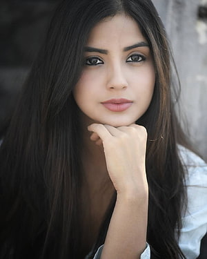 Kashmira Pardeshi Portrait with Long Dark Hair and Hand on Chin HD phone wallpaper
