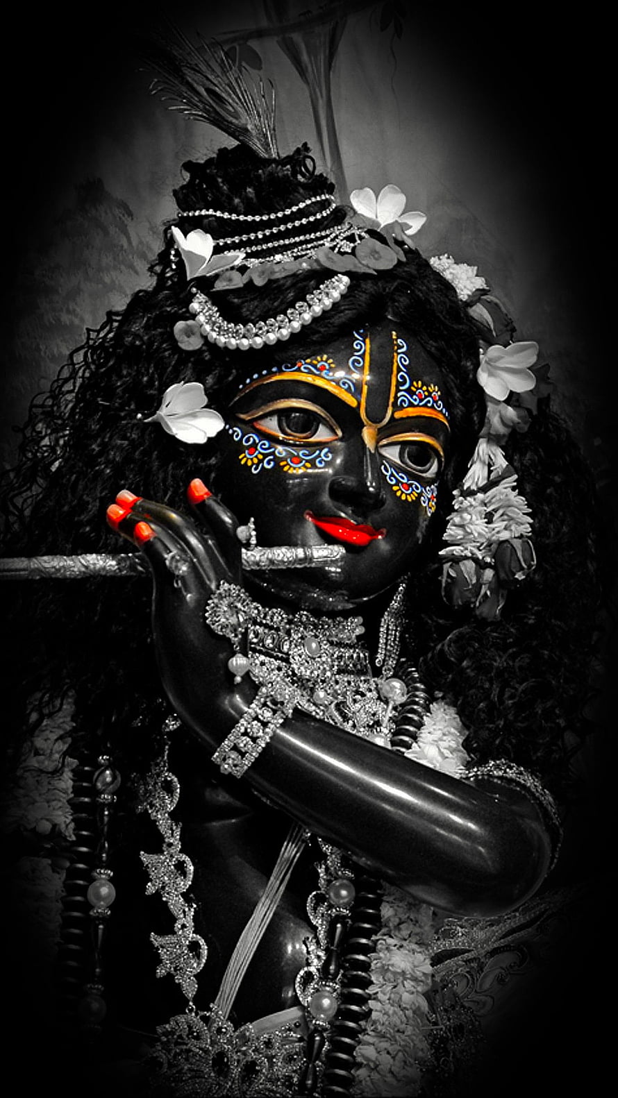 Dark Krishna Portrait with Floral Crown and Ornate Jewelry HD phone wallpaper