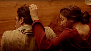 Tamasha Movie Scene: Intimate Moment Between Man and Woman in Warm Tones HD wallpaper