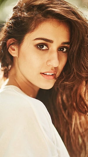 Disha Patani Portrait with Wavy Hair and White Top HD phone wallpaper