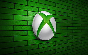 Glossy Xbox Sphere Emblem Mounted on a Textured Green Brick Wall HD wallpaper