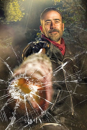Negan from The Walking Dead Shattering Glass with a Weapon in a Dramatic Action Scene HD phone wallpaper