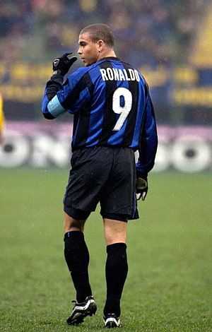 Ronaldo in Inter Milan Striped Kit on the Football Pitch HD phone wallpaper