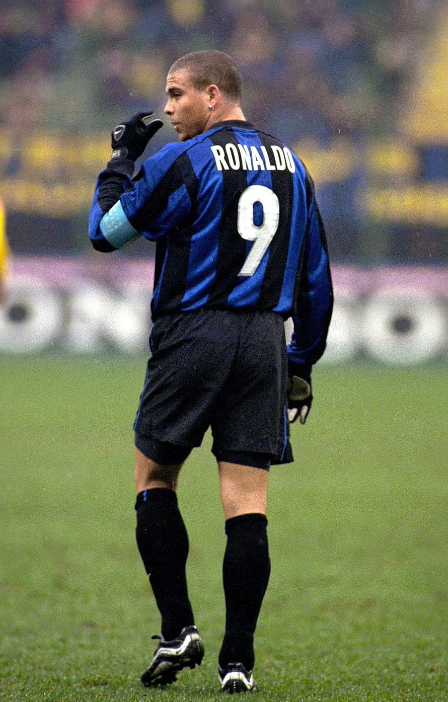 Ronaldo in Inter Milan Striped Kit on the Football Pitch HD phone wallpaper