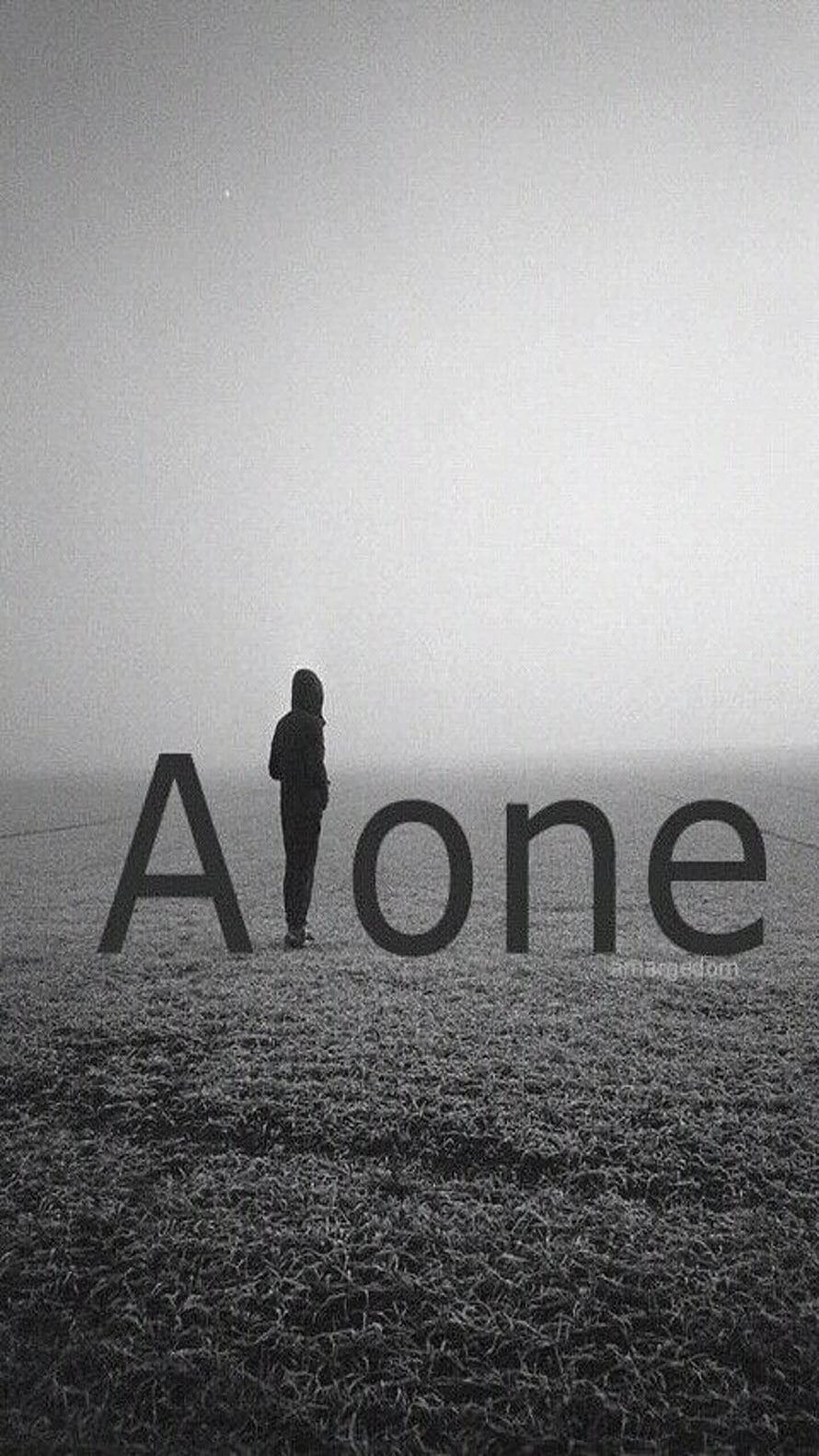 Solitary Figure Standing in Misty Field with Large Typography Overlay HD phone wallpaper