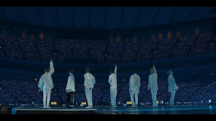 BTS Concert Stage View With Sea Of Blue Light Sticks In Stadium HD wallpaper