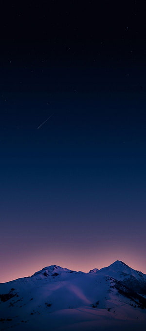 Snow-Capped Mountain Peaks Under a Starry Twilight Sky with Shooting Star HD phone wallpaper