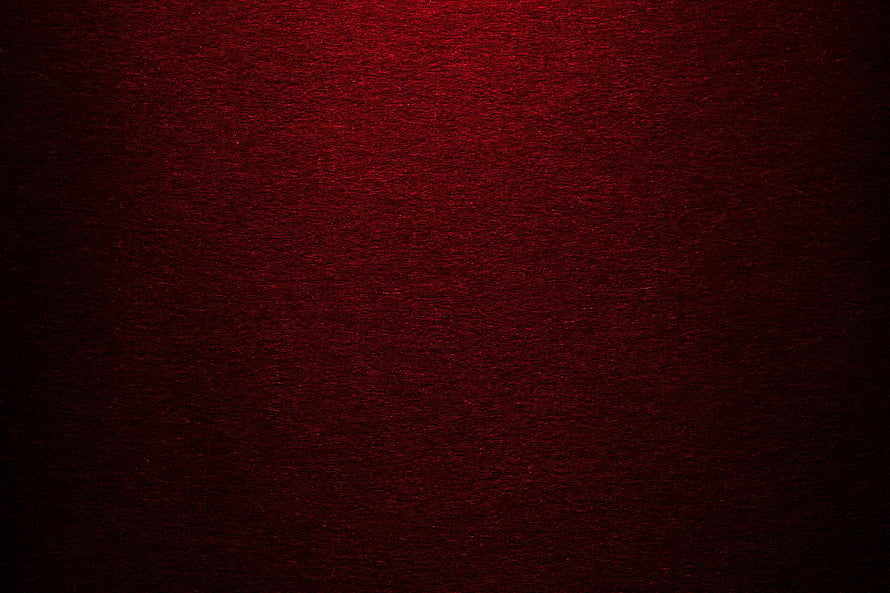 Dark Red Textured Surface with Subtle Grain and Vignette for Moody Backgrounds HD wallpaper