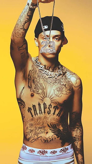 Central Cee Studio Portrait with Trapsta Tattoo and Diamond Jewelry on Yellow Background HD phone wallpaper