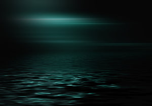 Dark Ocean Horizon with Teal Light Reflections and Minimalist Water Surface HD wallpaper