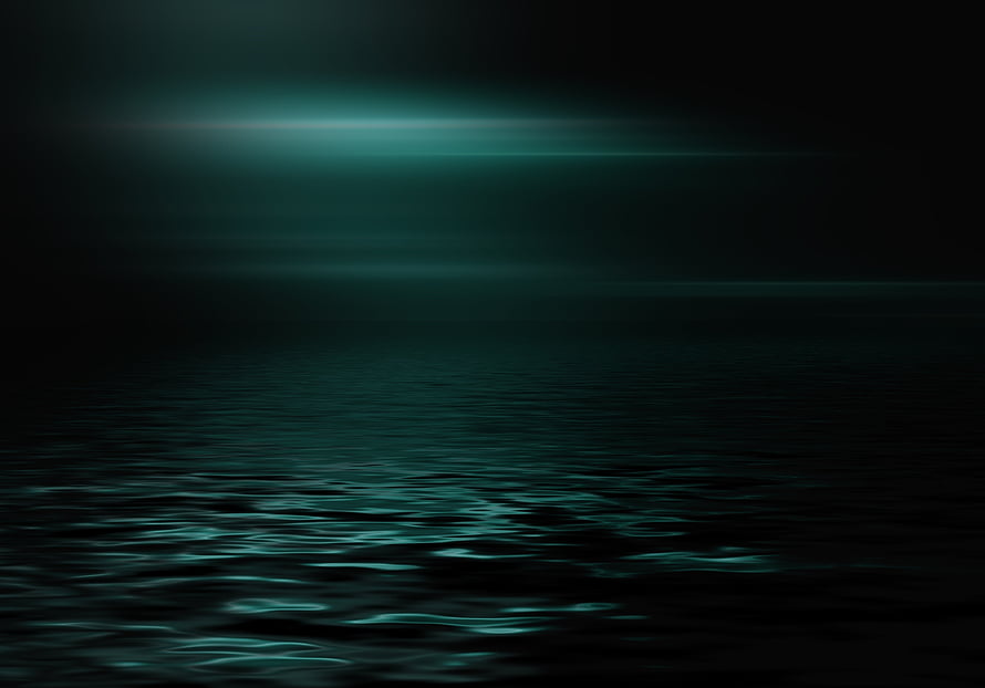 Dark Ocean Horizon with Teal Light Reflections and Minimalist Water Surface HD wallpaper