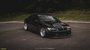 Black BMW M3 E92 Coupe with Stance Wheels Parked on Asphalt HD wallpaper
