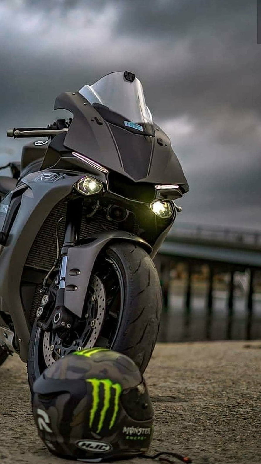 Yamaha R1 Superbike with Monster Energy Helmet Under Stormy Sky HD phone wallpaper