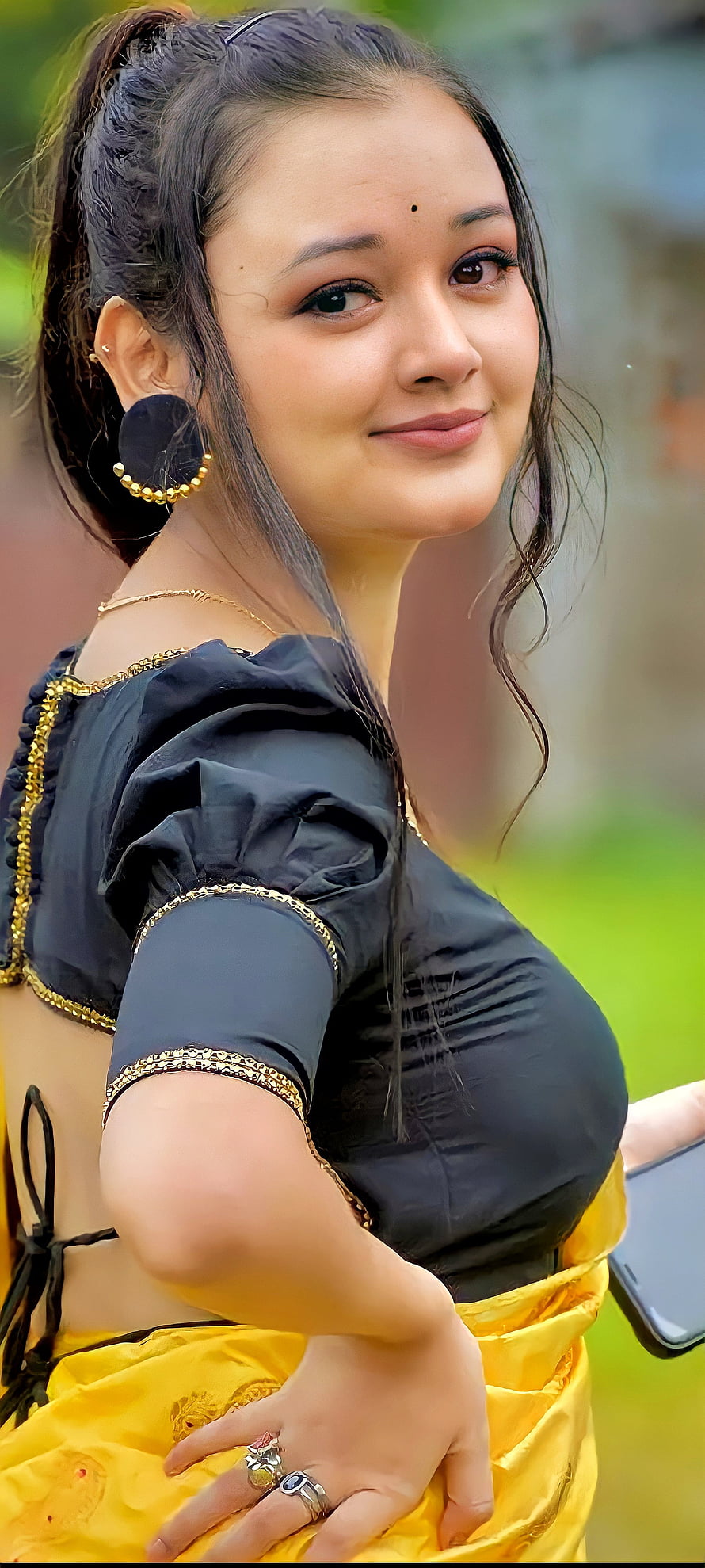 Indian woman in black and yellow traditional outfit with gold jewelry and large earrings, Beautiful girl, Beauty, indian HD phone wallpaper