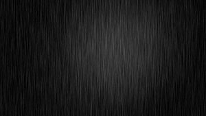 Dark Vertical Brushed Metal Texture with Subtle Center Glow HD wallpaper