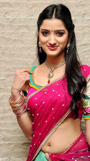 Young Woman in Vibrant Pink Saree with Gold Jewelry and Traditional Indian Attire HD phone wallpaper