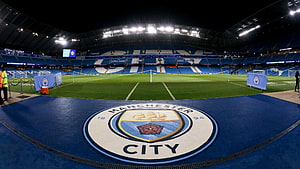 Manchester City Etihad Stadium Night View With Pitch Logo And Floodlights HD wallpaper