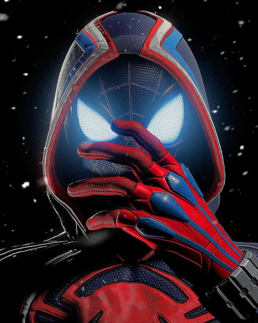 Spider-Man Iron Spider Armor Close-Up with Glowing Eyes and Snowfall, Spiderman, cine, superheroe HD phone wallpaper