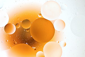 Macro Photography of Golden and White Oil Bubbles in Liquid HD wallpaper