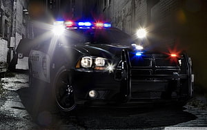 Need For Speed Police Pursuit Dodge Charger with Flashing Lights in Dark Alley HD wallpaper