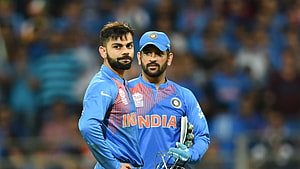 Virat Kohli and MS Dhoni in India Cricket Team Blue ODI Jerseys at Stadium HD wallpaper
