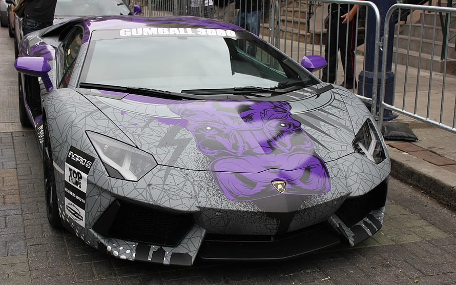 Lamborghini Aventador with purple graphic wrap at Gumball 3000 event HD wallpaper