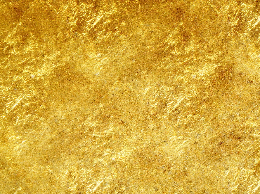 Shimmering Gold Foil Texture with Organic Metallic Surface and Warm Amber Tones HD wallpaper