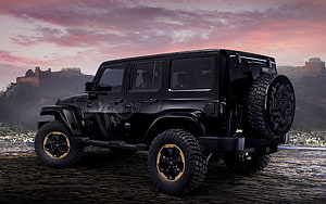 Black Jeep Wrangler Concept SUV with Dragon Graphics and Gold Accents at Sunset HD wallpaper