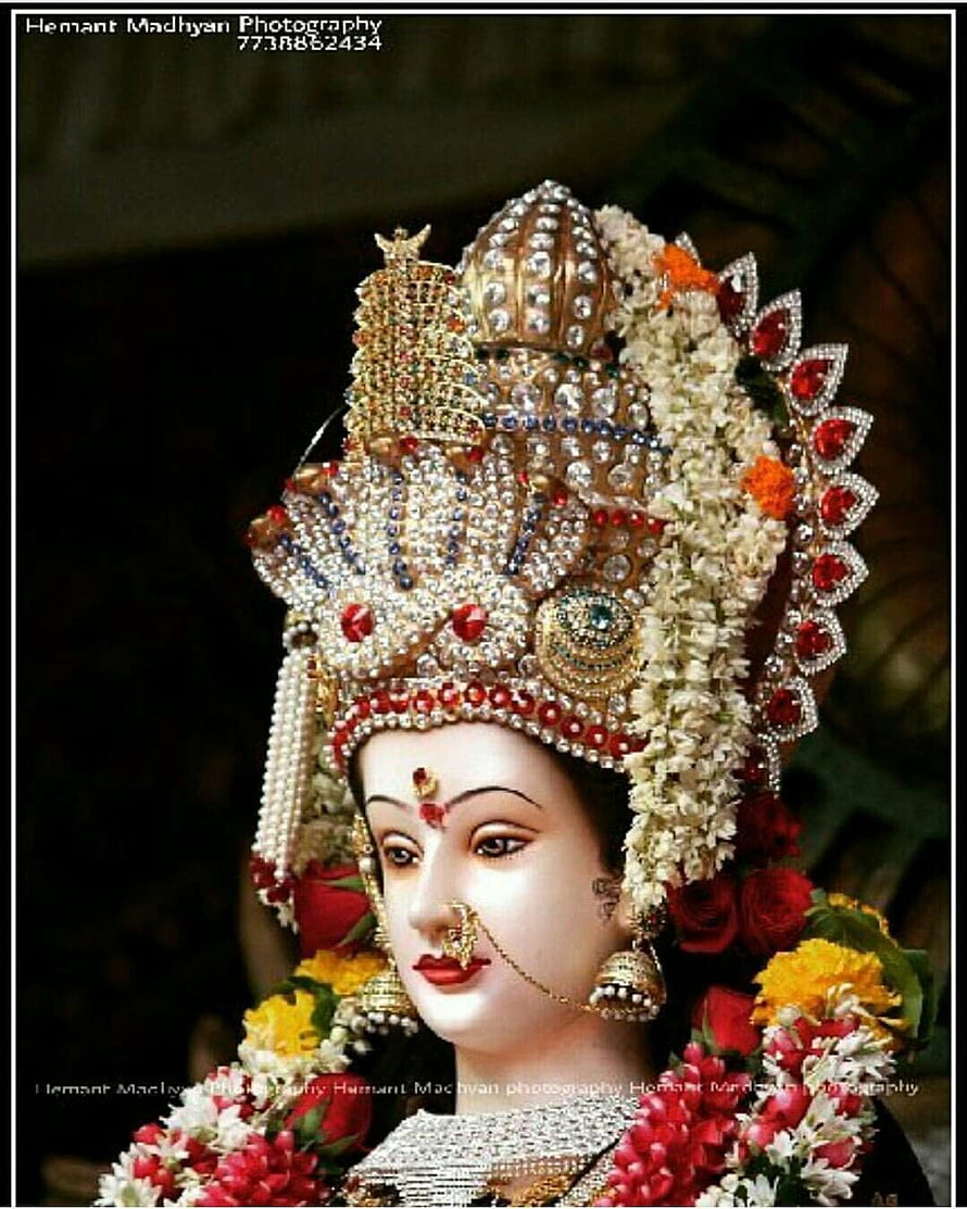 Ornate Durga Goddess Murti Adorned with Jewels and Floral Garlands HD phone wallpaper
