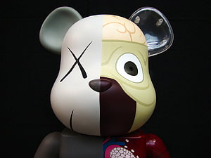 KAWS Companion Bearbrick Art Toy Sculpture with X Eye and Exposed Brain Detail HD wallpaper