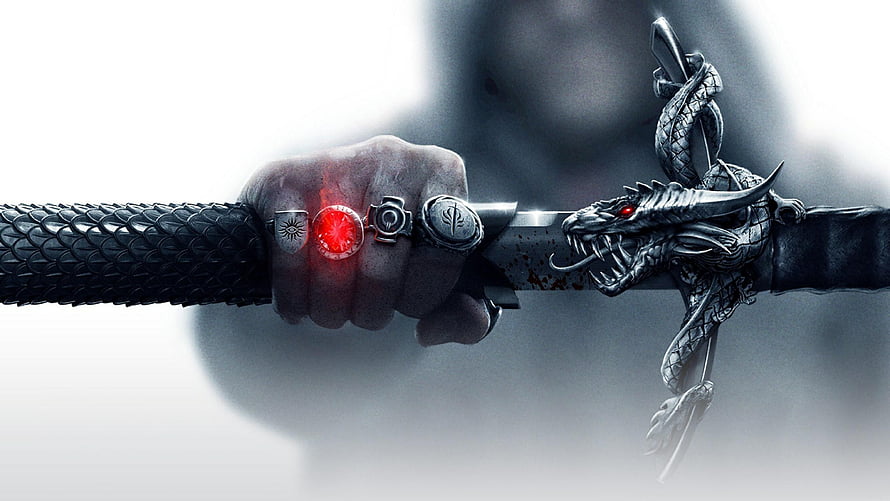 Hand Gripping Ornate Dragon Sword with Glowing Red Gem and Silver Rings HD wallpaper