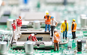 Miniature Workers Repairing a Computer Motherboard Circuit Board HD wallpaper