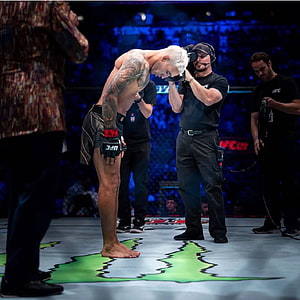 Charles do Bronx in the UFC Octagon with Headgear During a Mixed Martial Arts Event HD phone wallpaper