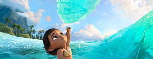 Baby Moana Reaching Toward a Glowing Ocean Bubble in Tropical Waters HD wallpaper