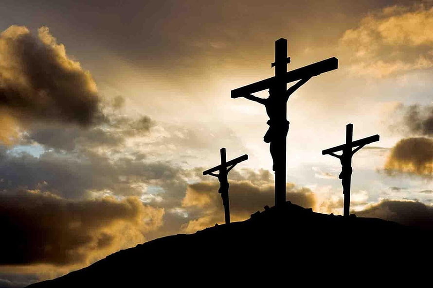 Silhouette of the Crucifixion of Jesus on Golgotha Against a Dramatic Golden Sky HD wallpaper