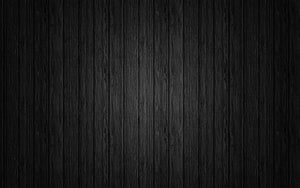 Dark Charcoal Wood Plank Texture with Vertical Grain Pattern HD wallpaper