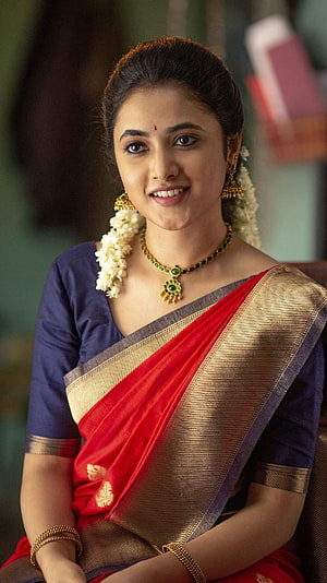 Priyanka Mohan in Traditional Red and Gold Silk Saree with Floral Garland HD phone wallpaper