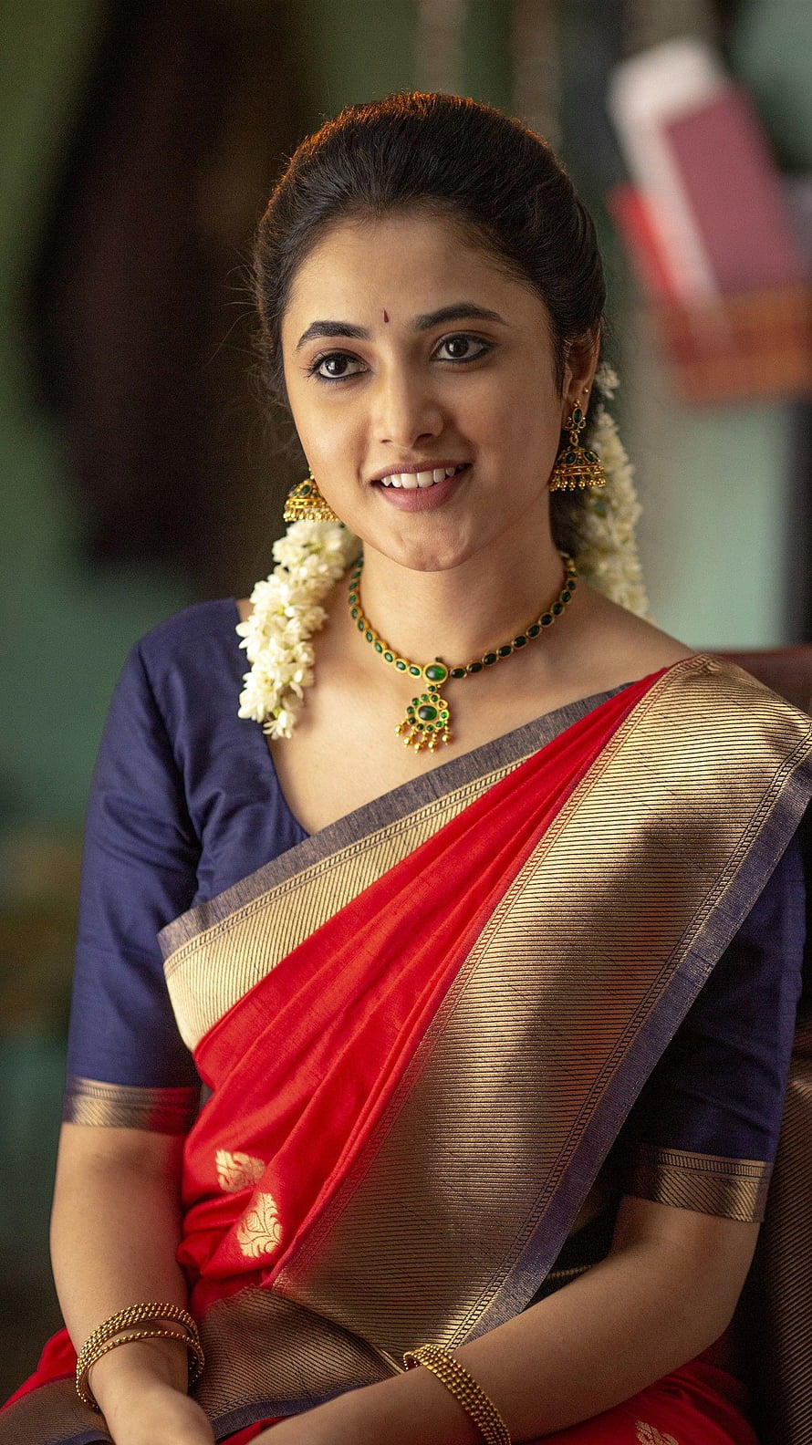 Priyanka Mohan in Traditional Red and Gold Silk Saree with Floral Garland HD phone wallpaper