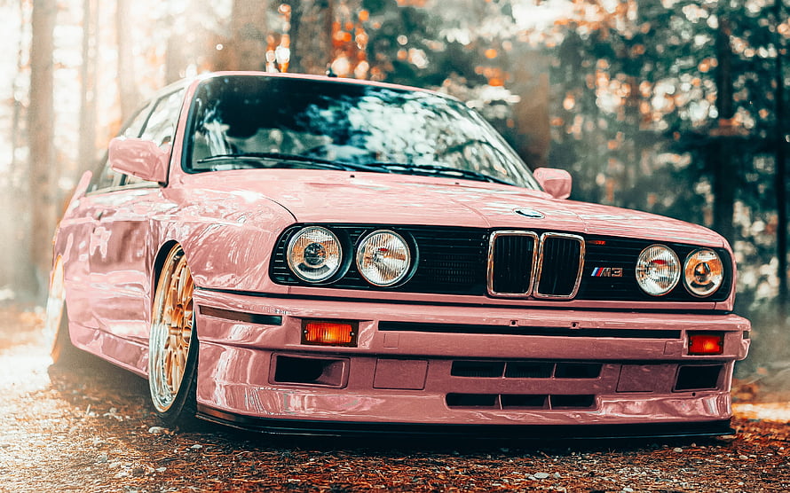 Pink BMW M3 E30 with Gold Wheels Parked in a Forest HD wallpaper