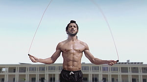 Milkha Singh Jump Rope Workout in Black Shorts HD wallpaper
