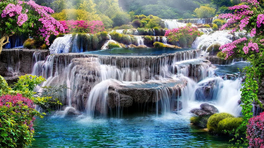 Lush Tropical Waterfall Cascading Through Vibrant Pink Flowers and Green Foliage HD wallpaper