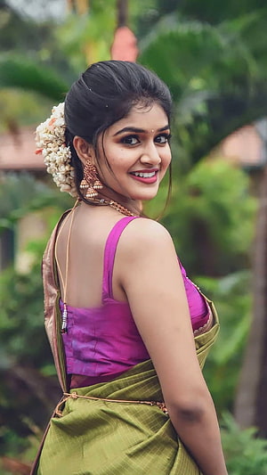 Sanjana Anand in Traditional Green Saree with Floral Hairpiece and Gold Jewelry HD phone wallpaper